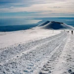 etna innevata e vista mare